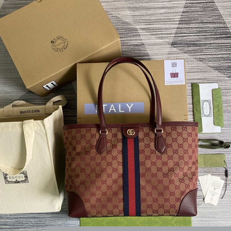 G*u*i shopping bags